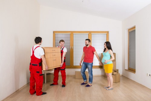 Packed office furniture and boxes ready for transport