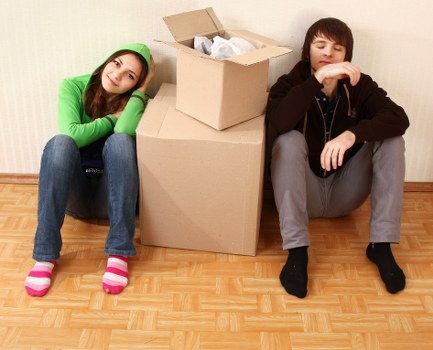 House removalists loading boxes and furniture in central London near Knightsbridge