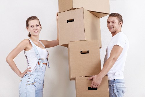 Business relocation team transporting office equipment in central London