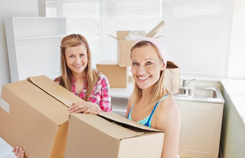 Professional removals crew loading items for a house move in Knightsbridge