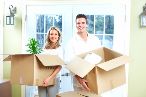 Bulky household furniture ready for pick-up from a Knightsbridge flat