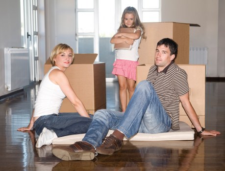 Professional movers loading a van in central London